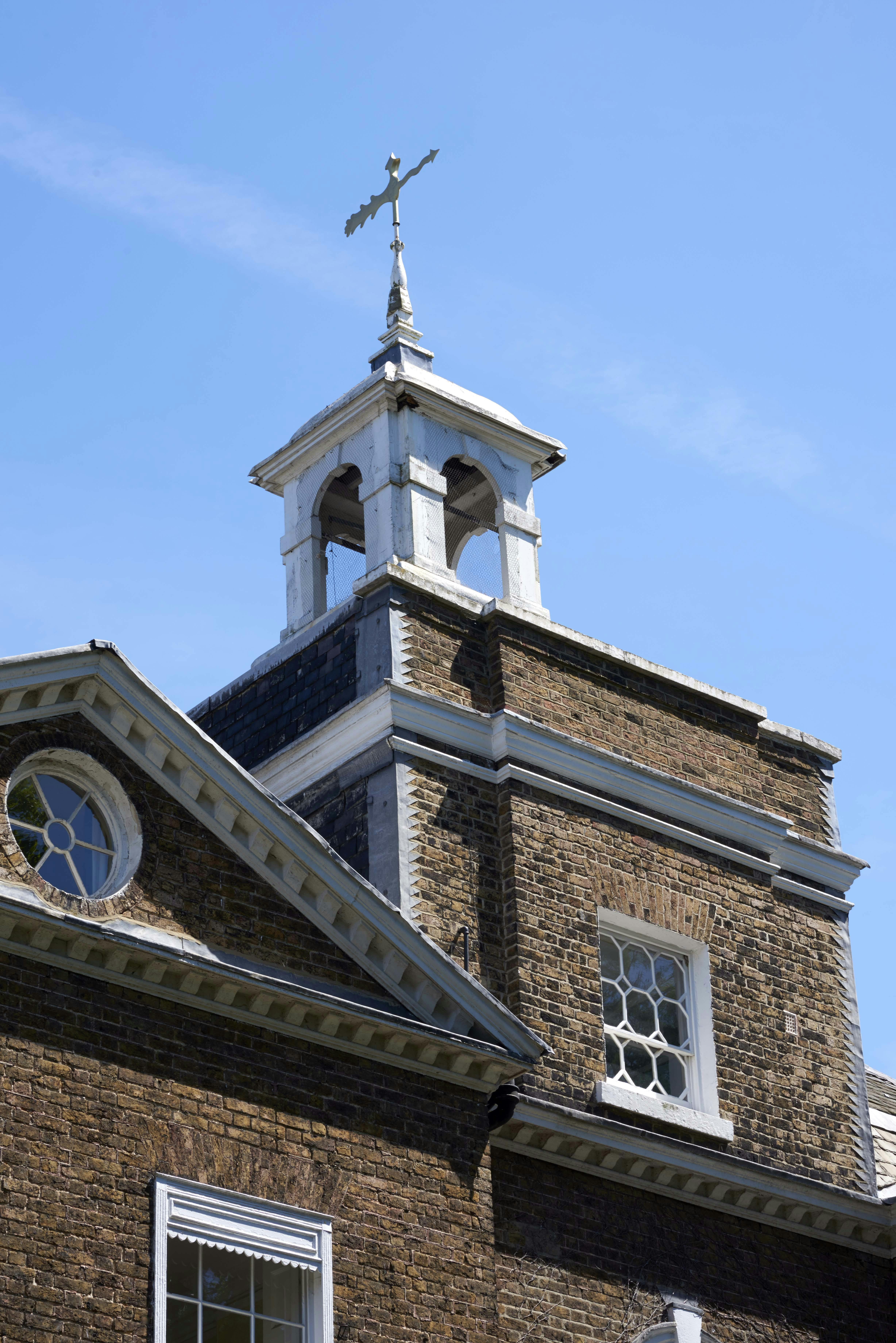 Lutyens' Room at Bell House with elegant bell tower, perfect for historic events.