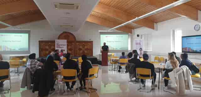 Corporate training session in Nishkam Centre conference hall for intimate workshop events.