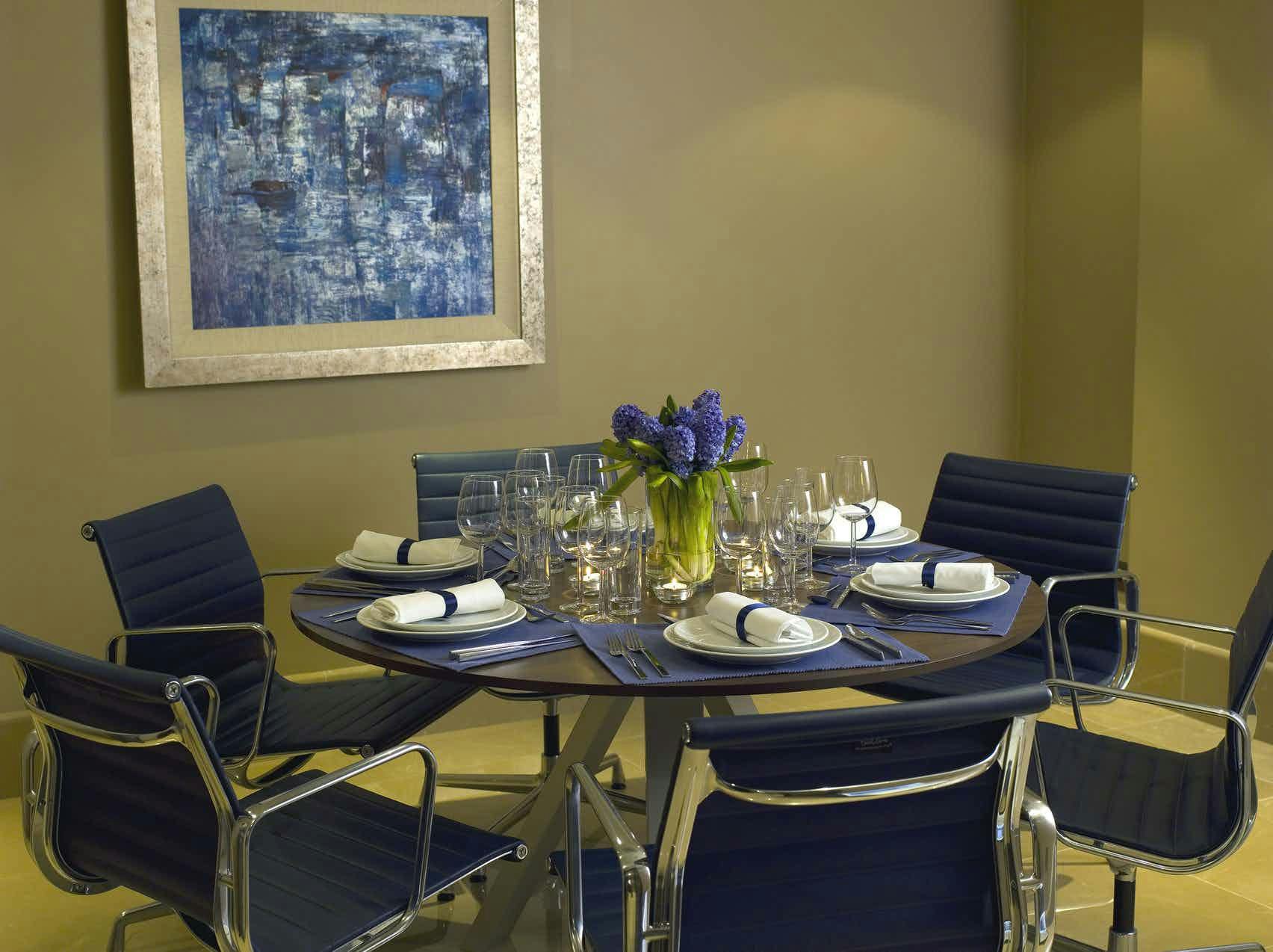 Private Suite 10 at The May Fair Hotel, elegant round table for corporate meetings.