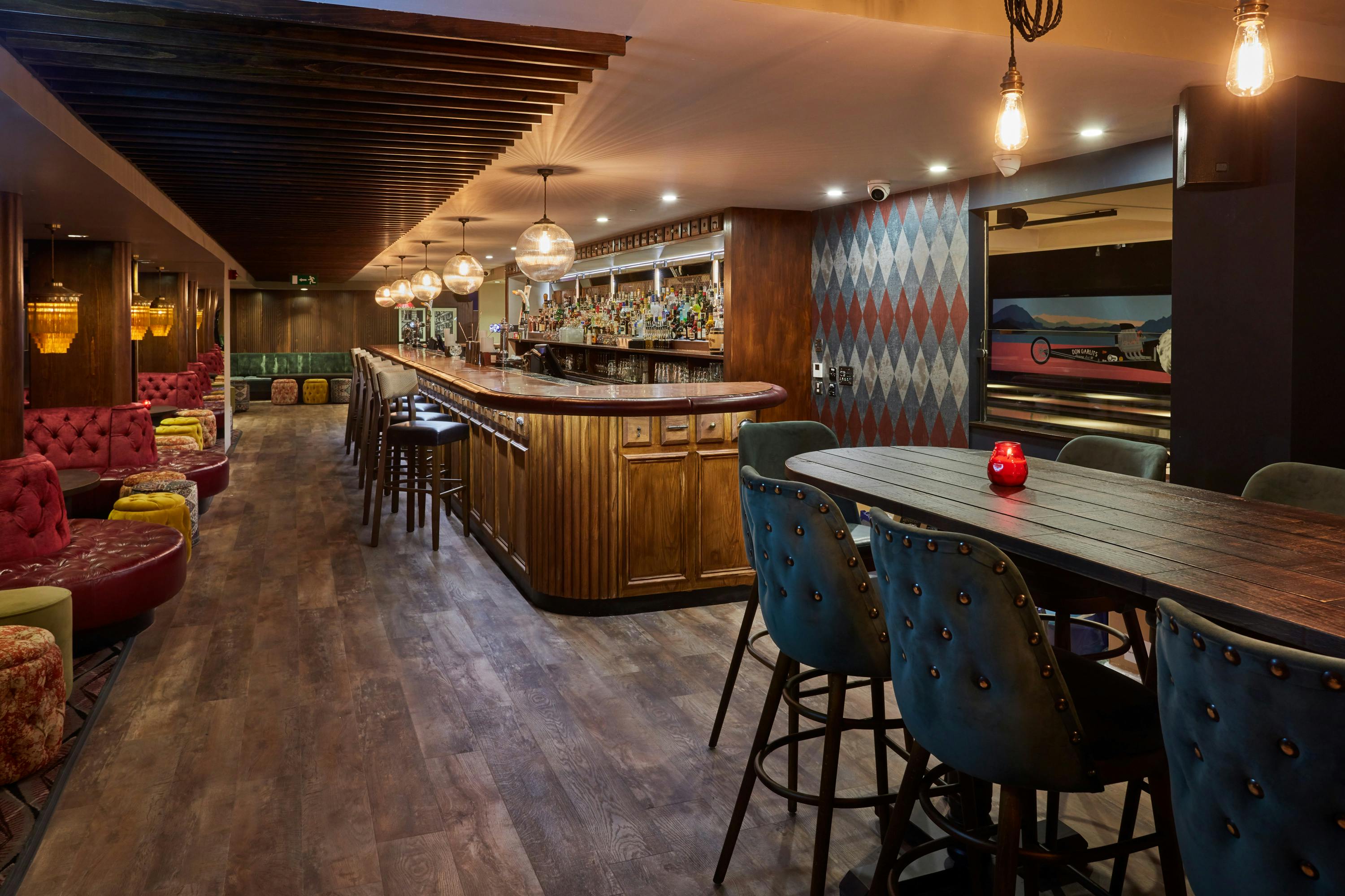 Stylish bar area at All Star Lanes, perfect for cocktail receptions and networking events.