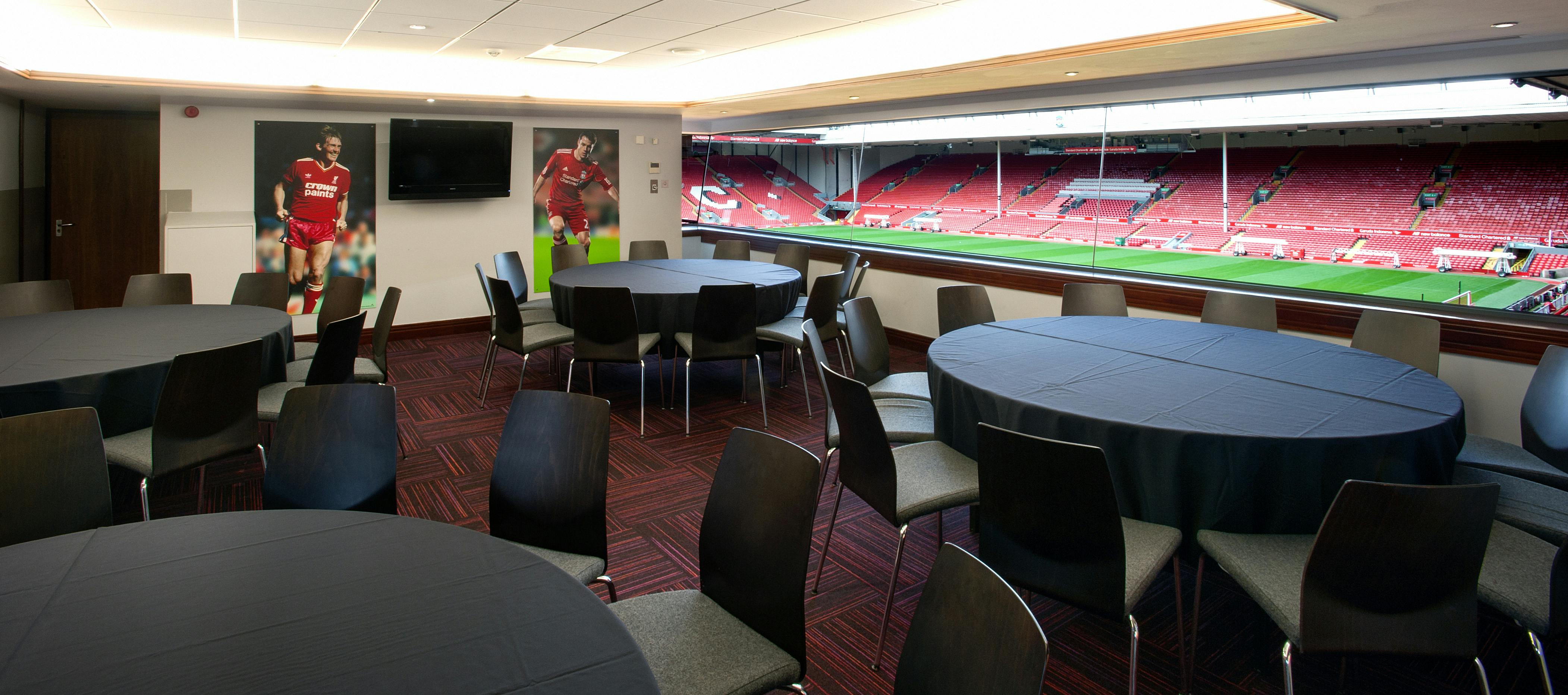 "Executive box 1A at Liverpool FC, modern meeting space with stadium views for corporate events."