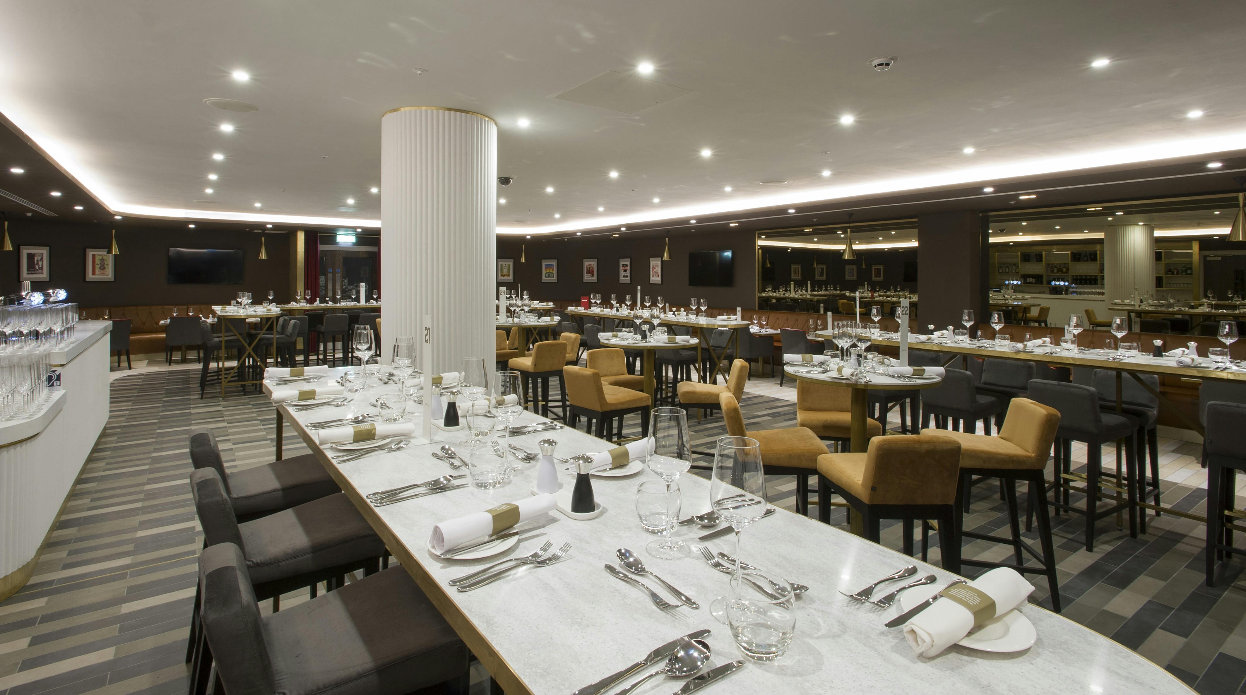 Legends Lounge at Liverpool FC: elegant dining space for corporate events and networking.