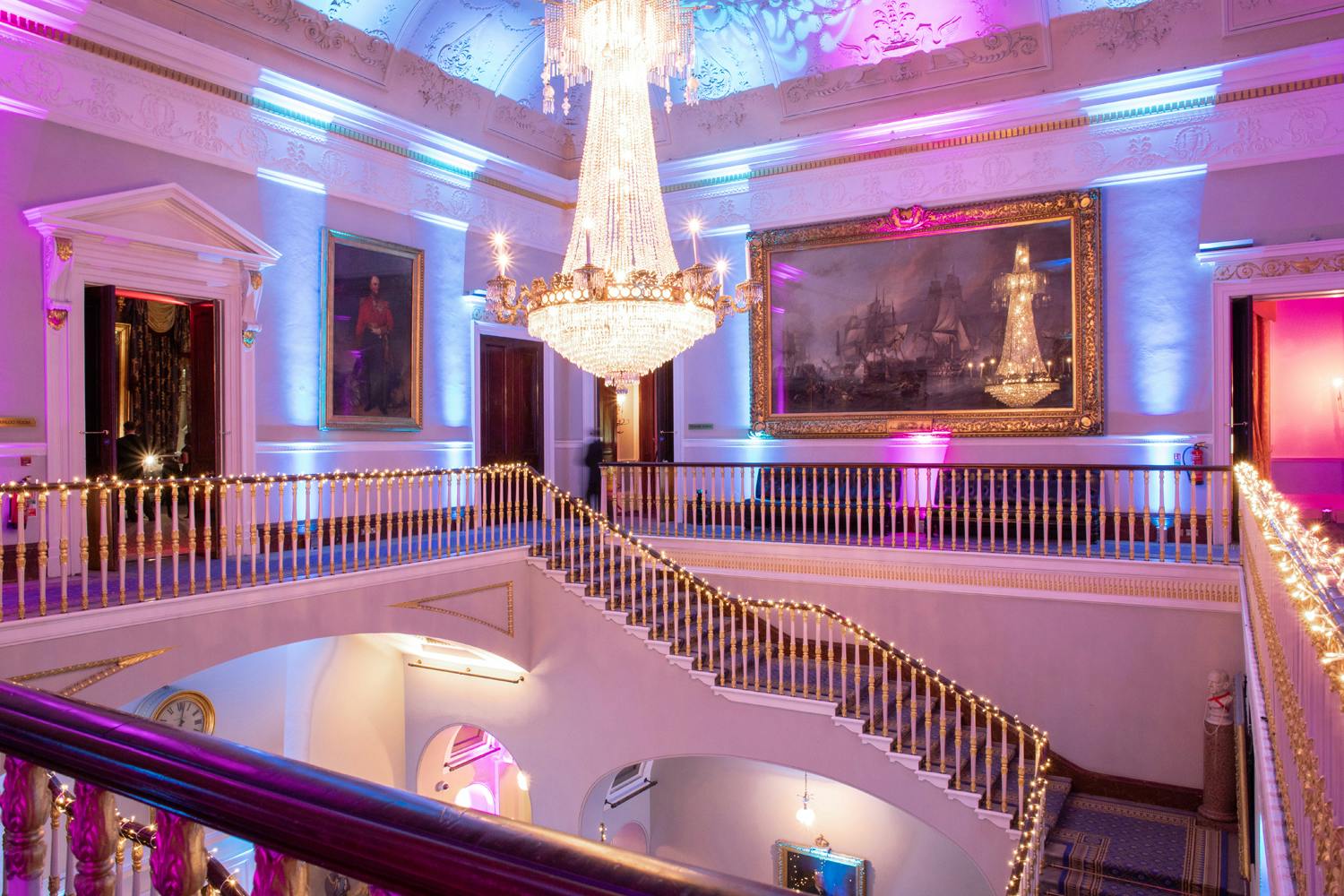 Elegant event space at Waterloo, featuring a grand chandelier and ideal for receptions.