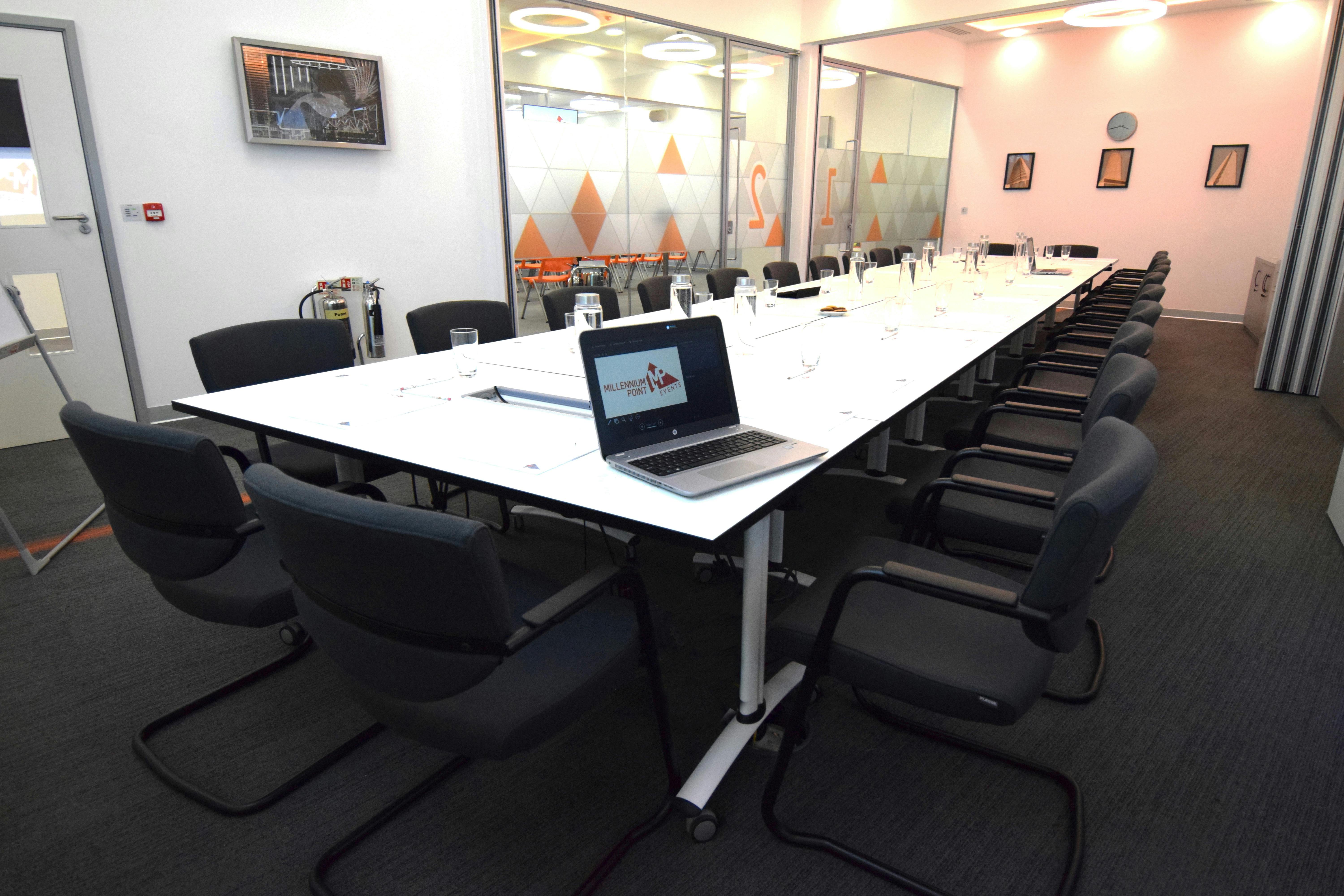 Modern conference room at CONNECT Event Space, ideal for meetings and presentations.