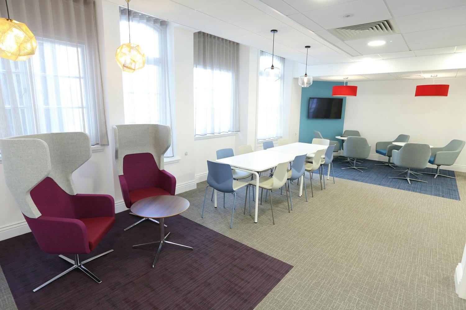 Modern meeting space at IoD Academy, featuring collaborative seating for events and workshops.