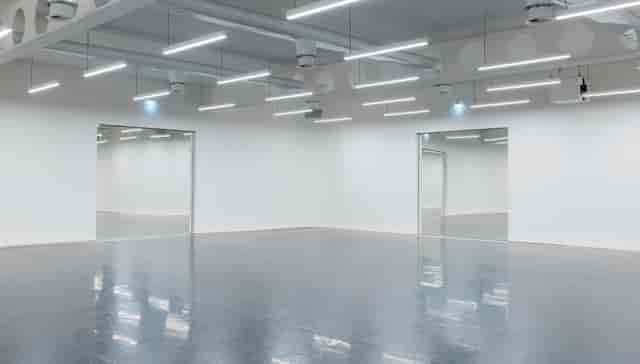 Versatile event space in Studio Wayne McGregor with polished floor and natural light.
