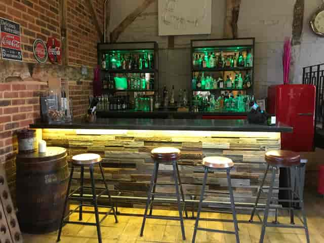 Stylish bar area in St Michaels Grange Barn for networking events and social gatherings.