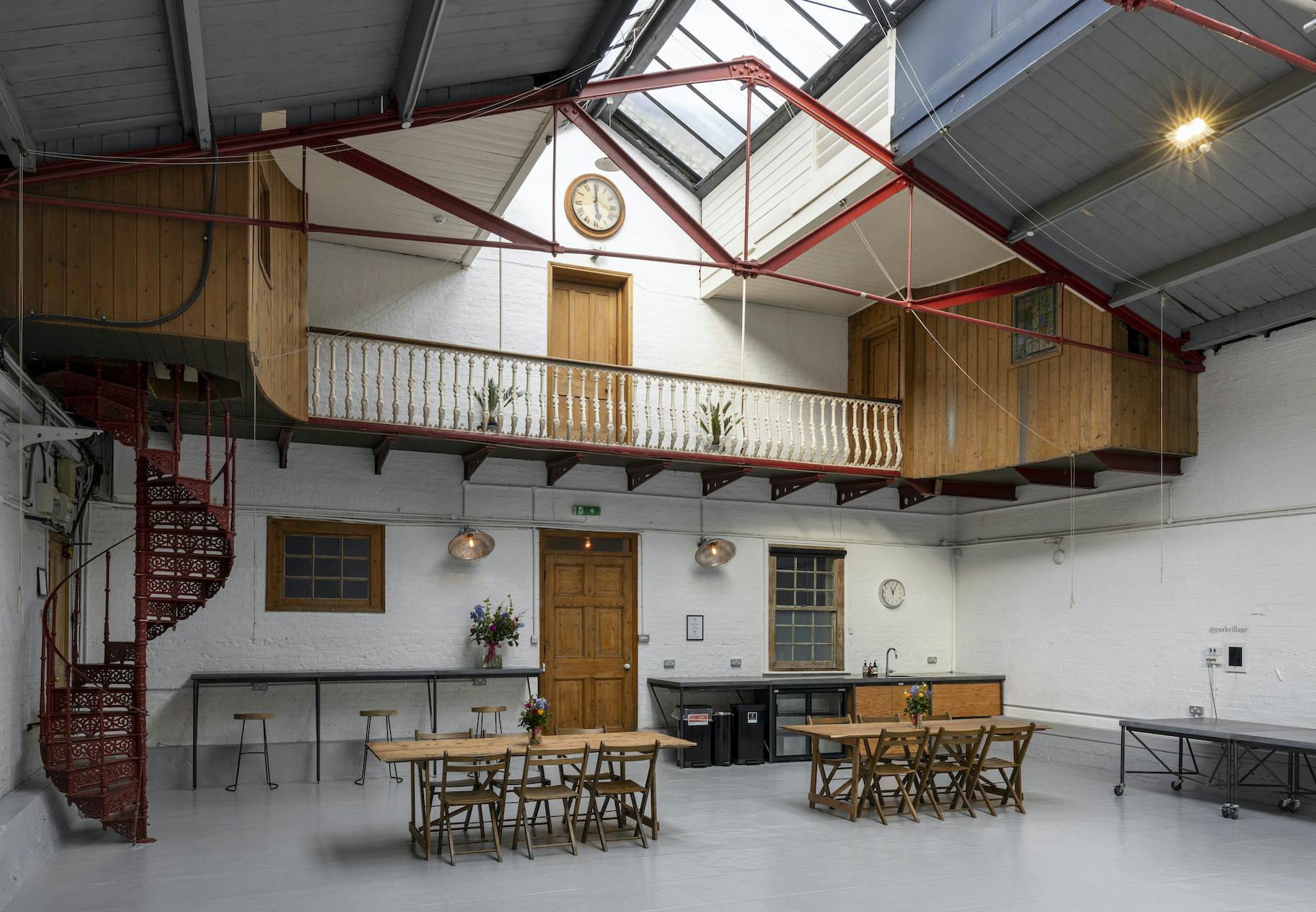 The Arena in Park Village: industrial-chic event space with high ceilings for workshops.