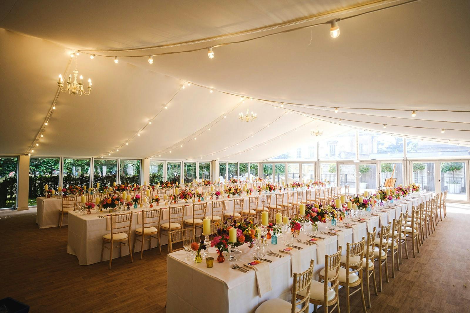 Elegant Garden Pavilion event space with floral centerpieces for weddings and gatherings.