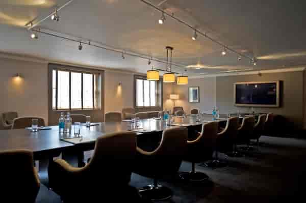 Boardroom at Home House with large conference table, ideal for meetings and presentations.