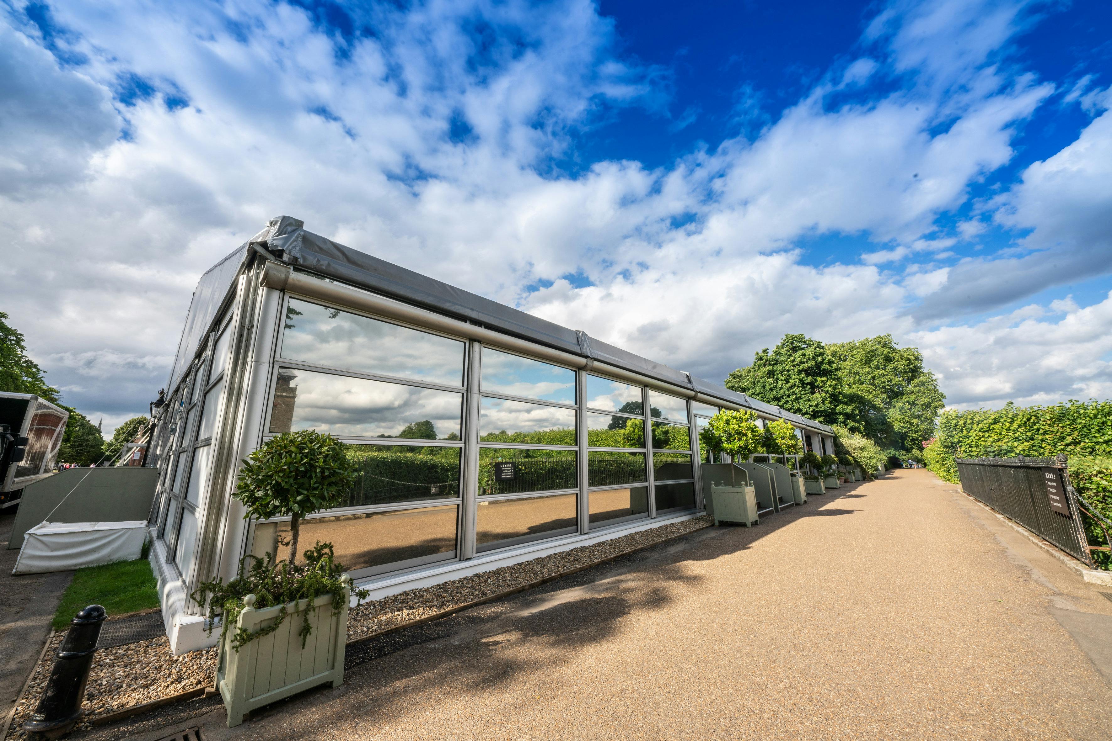 Kensington Palace Pavilion marquee with large windows, ideal for elegant outdoor events.