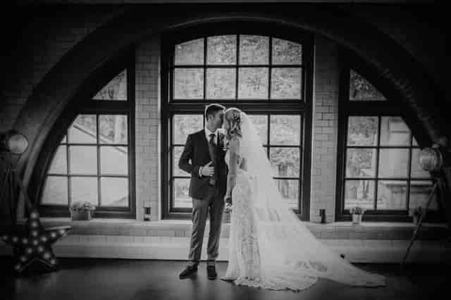 Elegant couple in The Ollerton Room, ideal for weddings and intimate events.