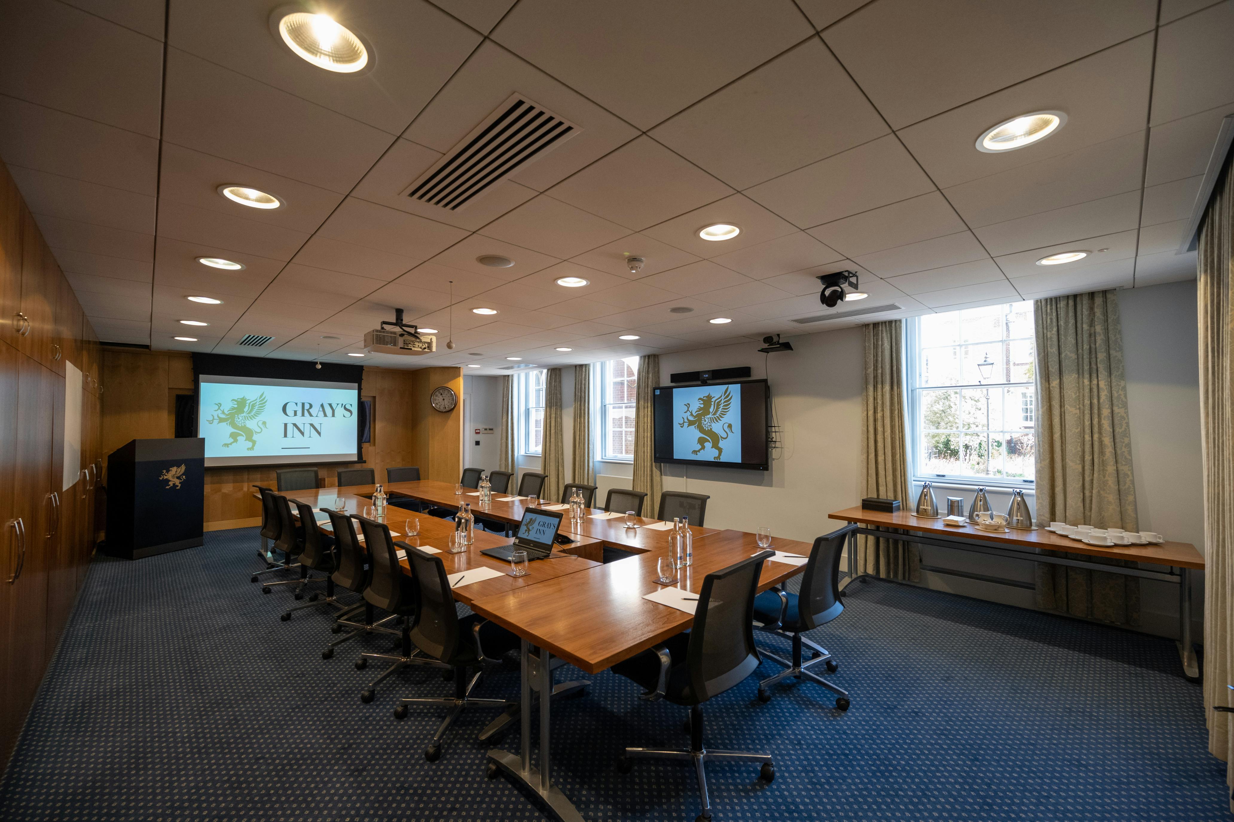 Rose Heilbron Room at Gray's Inn: modern meeting space with large conference table.