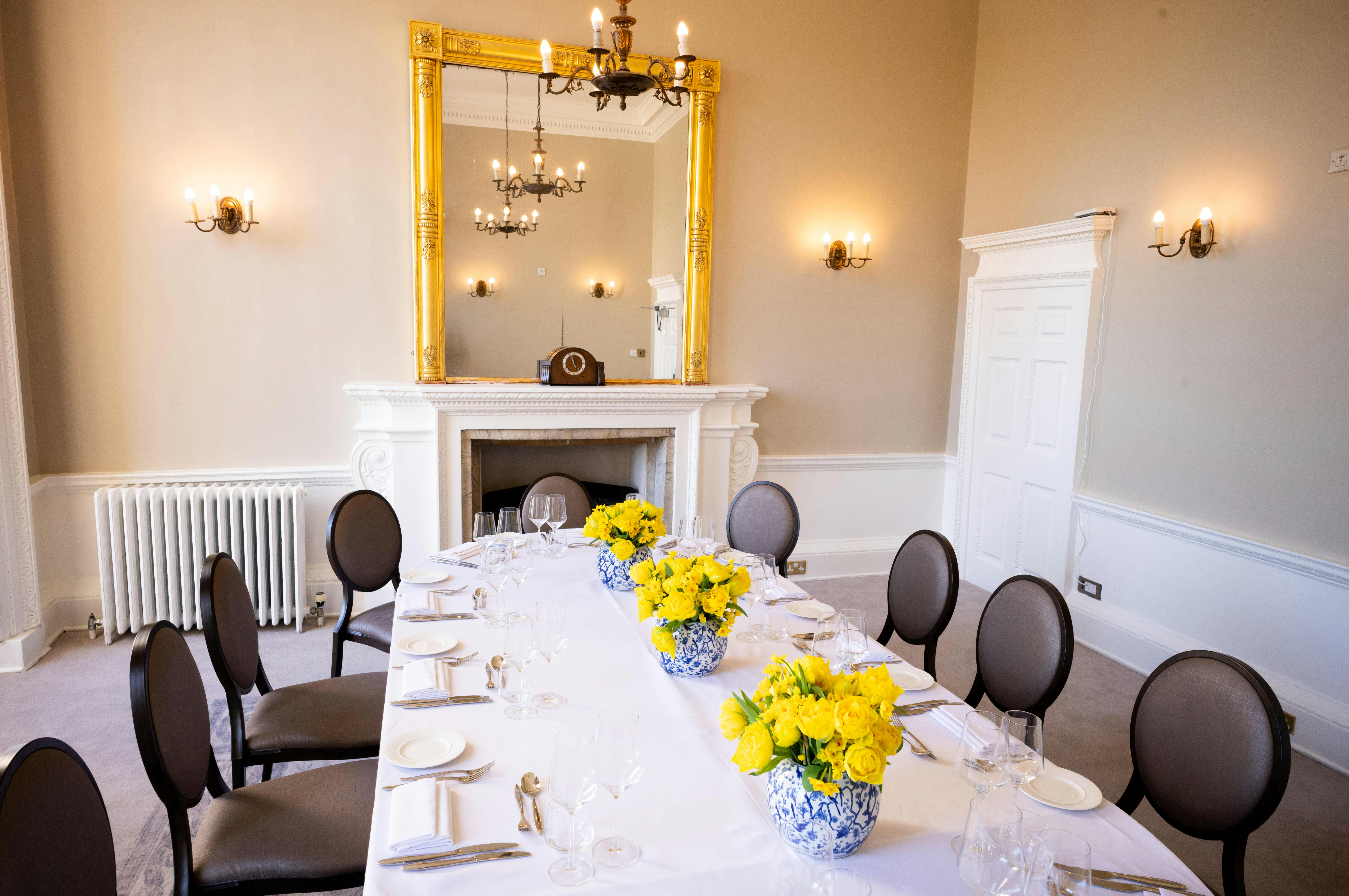 Bennet-Clark Room with elegant table setting for corporate events and intimate gatherings.