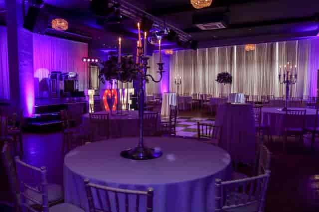Port of Liverpool Suite at The Bentley, elegant wedding venue with purple hues and romantic decor.