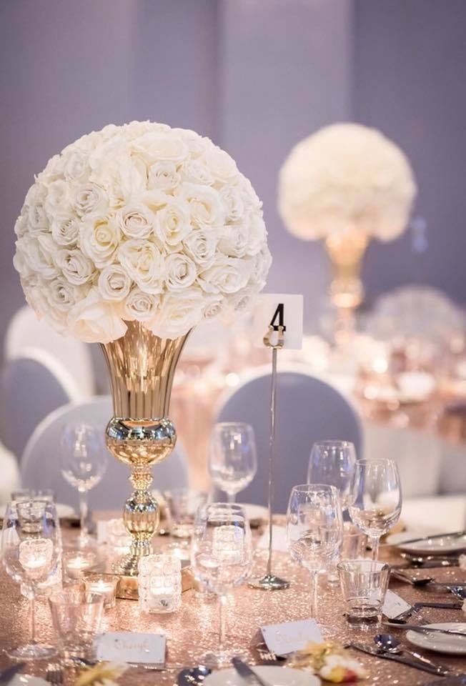 Cunard Suite table with white rose centerpiece, perfect for weddings and corporate events.