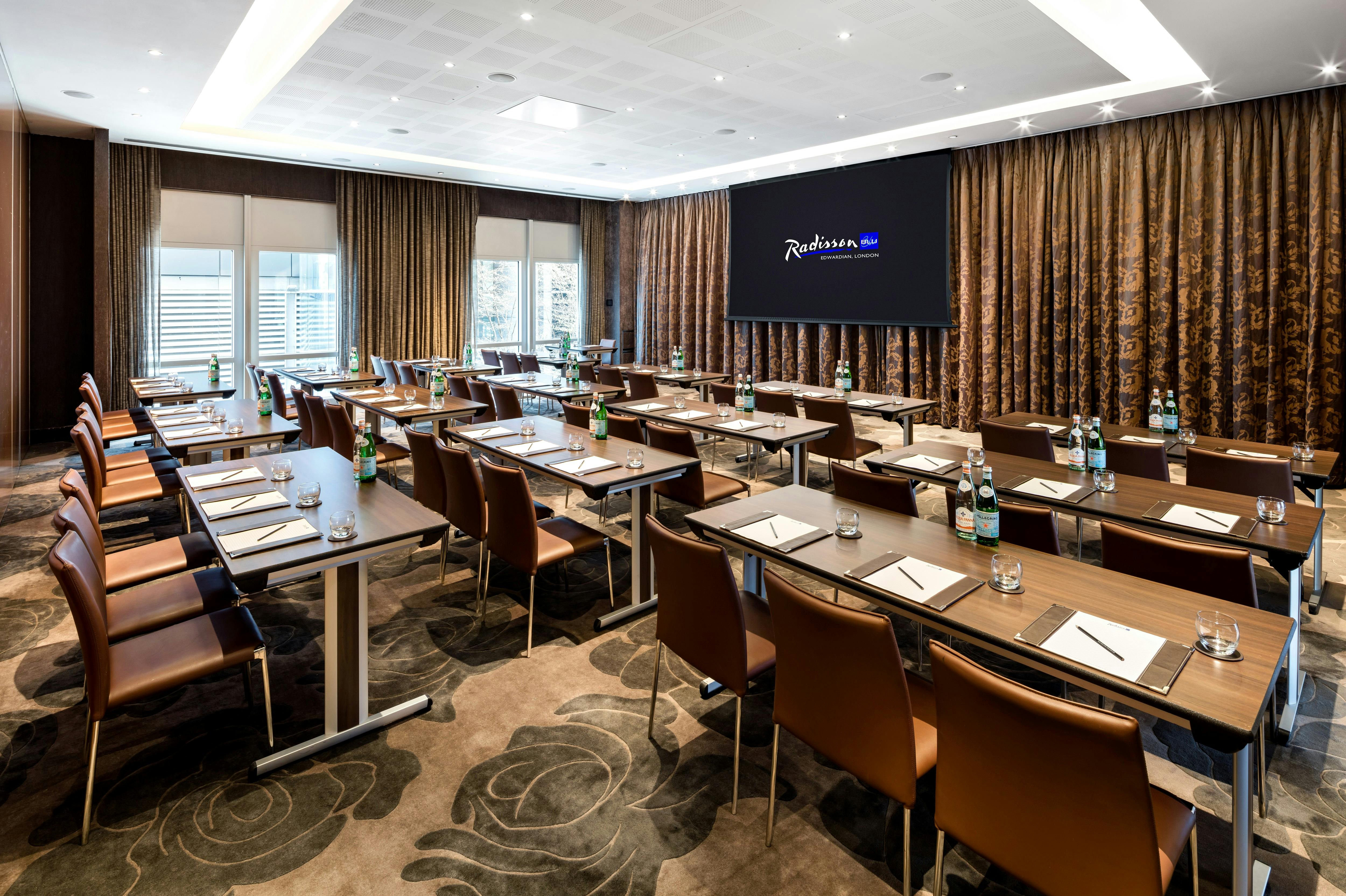 Modern meeting room at Radisson Blu, ideal for corporate events and workshops.