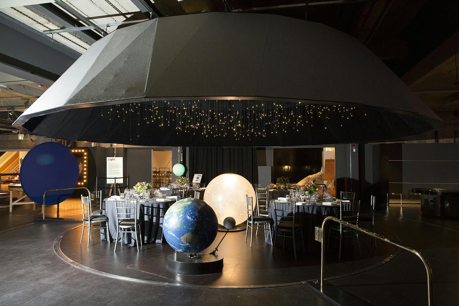 Wonderlab event space with celestial ceiling, ideal for corporate events and gatherings.