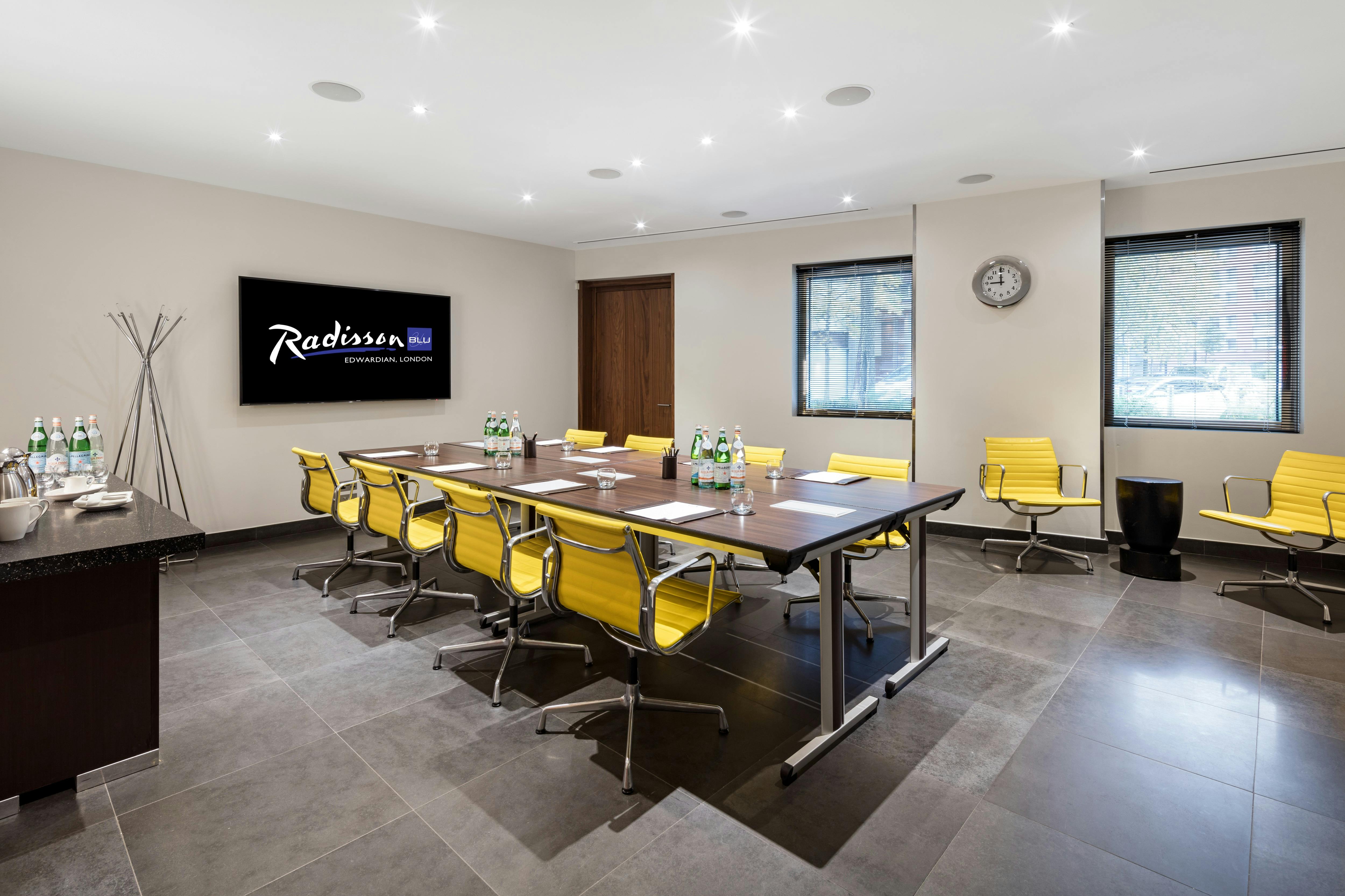 Modern meeting room with ergonomic chairs at Radisson Blu for productive events.