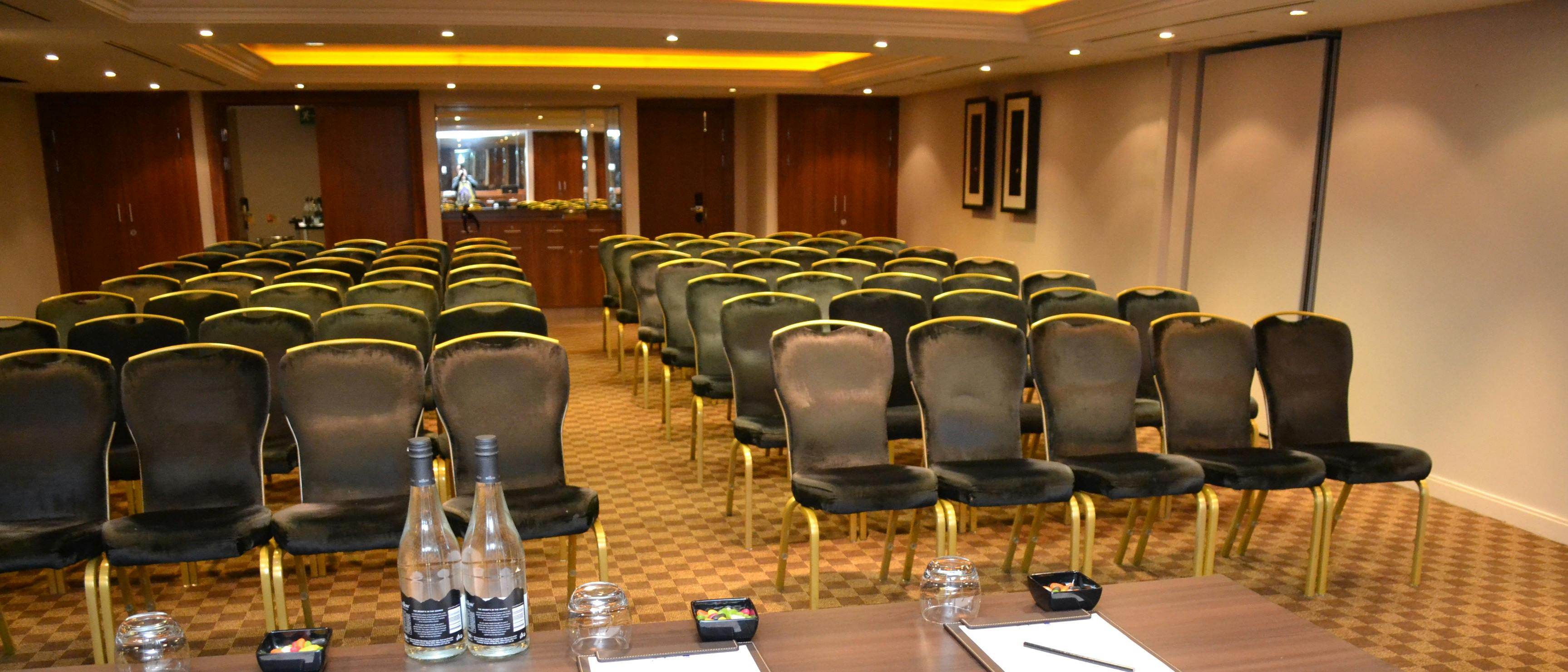 Elegant meeting room setup for a conference at The Edwardian Manchester Hotel.