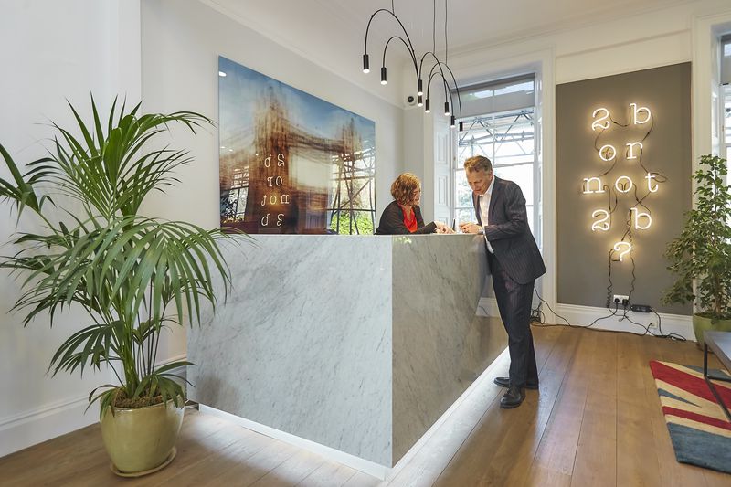 Modern reception area at CIEE Global Institute-London, ideal for events and guest services. - Banner