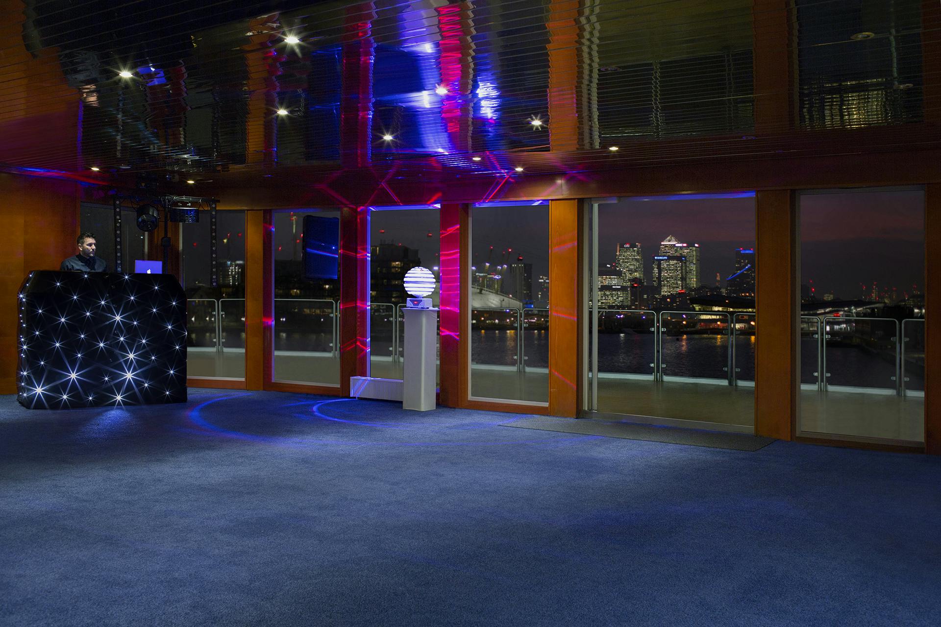 Exclusive Hire event space in Sunborn London Yacht Hotel with DJ setup and city views.