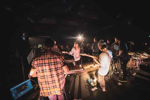 Eclipse Theatre performance with diverse band, engaging atmosphere for events and meetings.