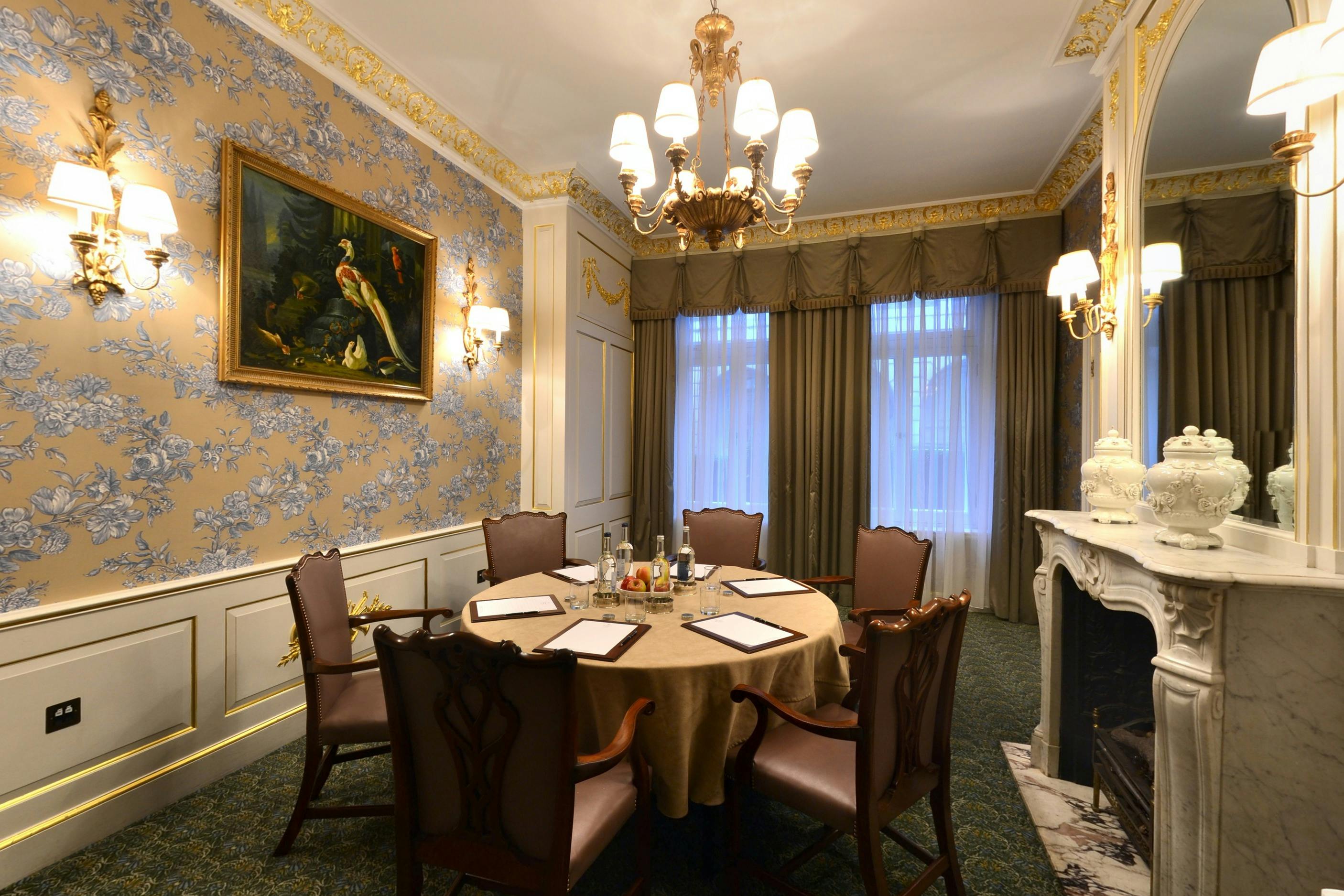 Elegant meeting room with floral wallpaper for corporate events at The Stafford London.