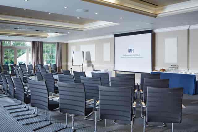 The Shelley Suite meeting room with modern chairs, perfect for professional events.