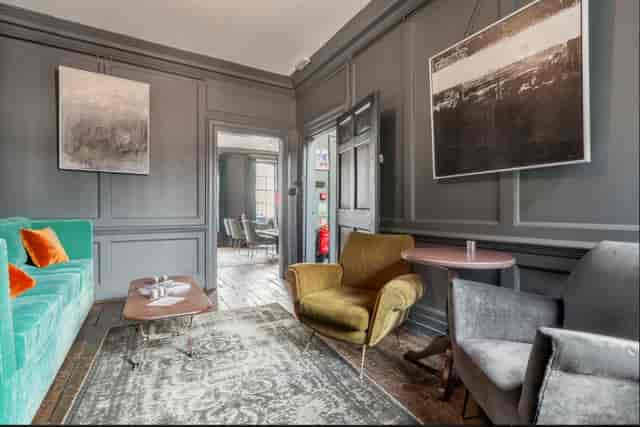 Stylish meeting space in Blacks with modern decor, ideal for intimate events and brainstorming.