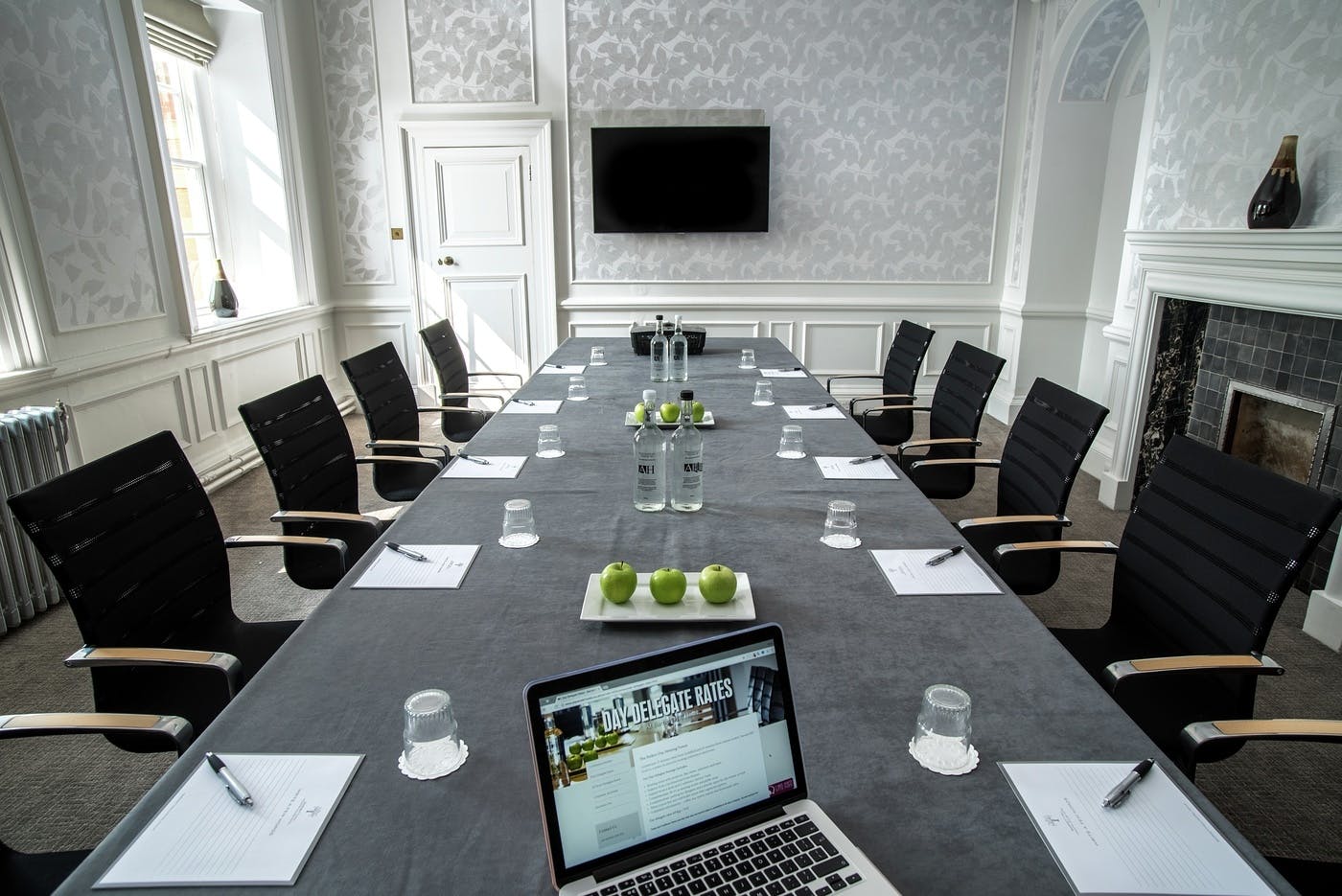 Meeting room at Barnett Hill Hotel with modern decor, ideal for corporate events.