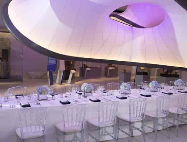 Science Museum gala: organic ceiling, blue flowers, corporate event.