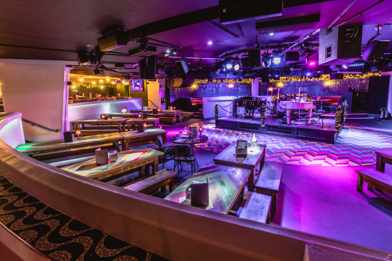 Vibrant event space at The Piano Works West End for corporate and social gatherings. - Banner
