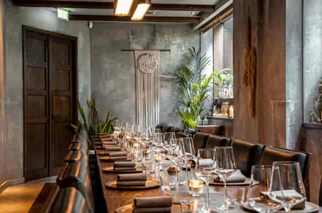 Chef's Table in KOL: Elegant long table setup for executive meetings and private dinners.