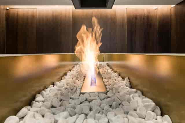 Modern fire feature in SALON64, perfect for networking events and gatherings.