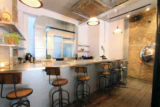 Industrial-chic Iron Bloom event space for networking and cocktail receptions.