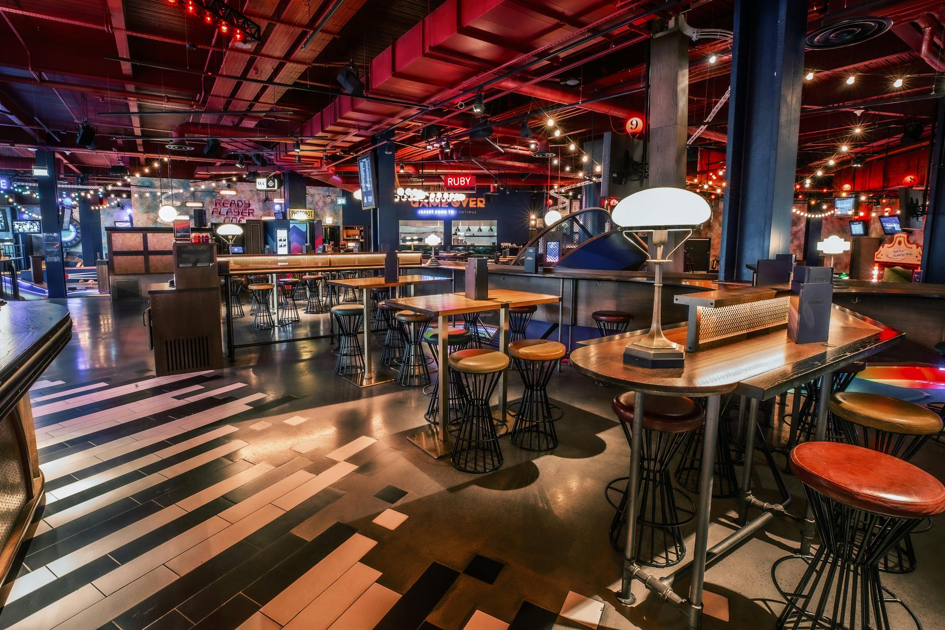 Emerald Area at Puttshack White City, vibrant event space for gatherings and corporate events.
