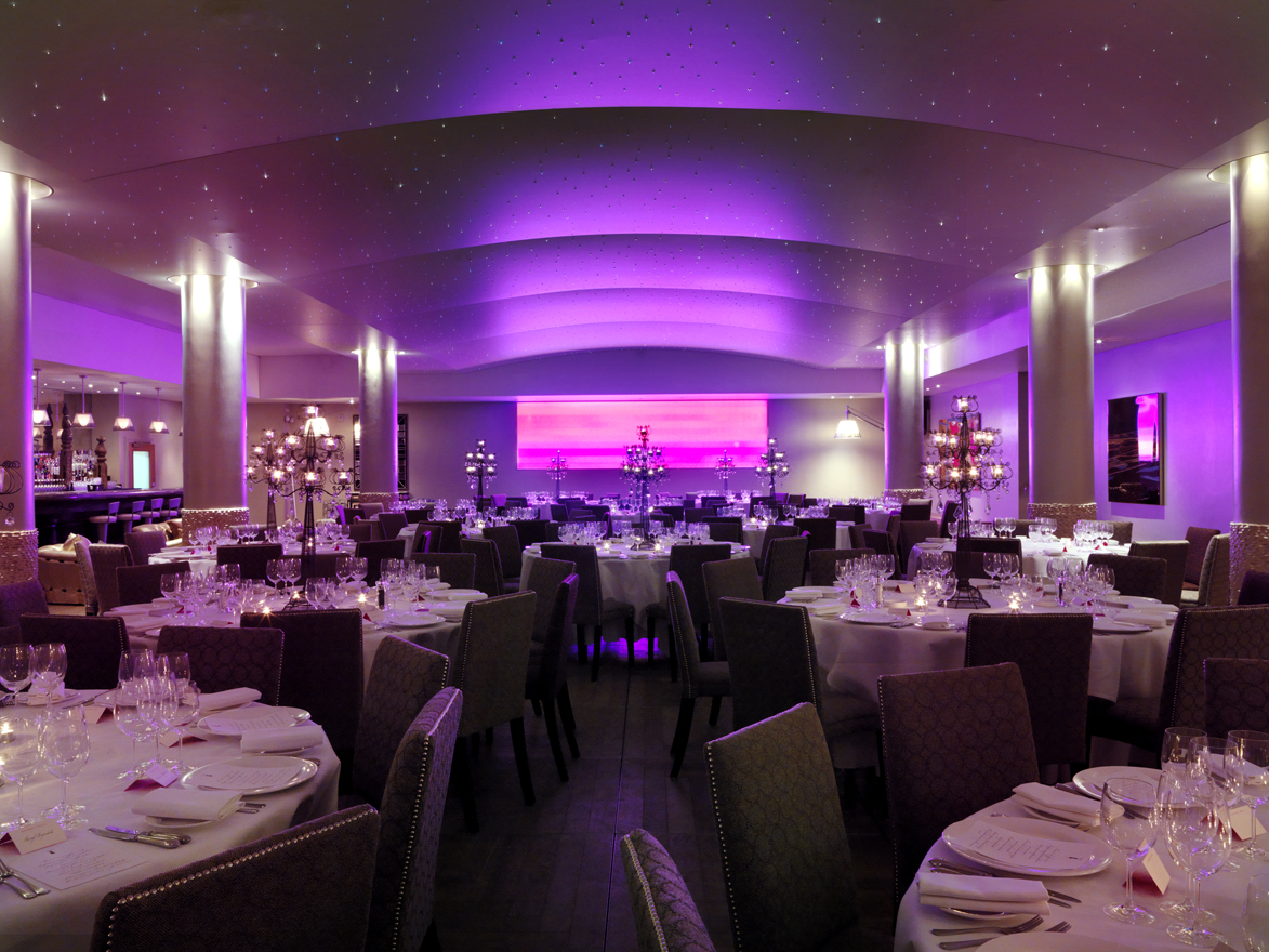Elegant dining setup in Haymarket Hotel pool area for upscale events and gatherings.
