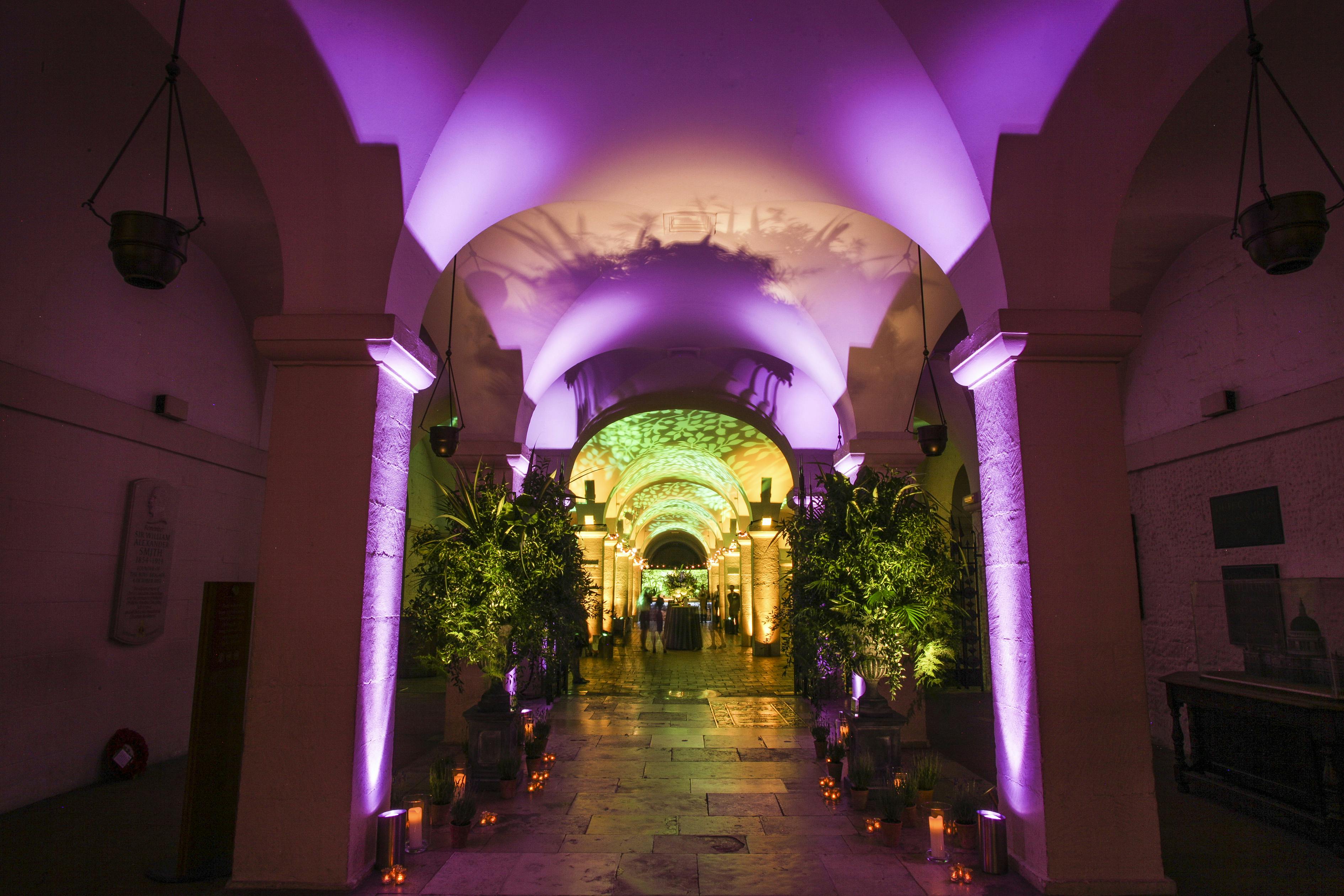 St. Paul's Cathedral Crypt with vibrant lighting, ideal for receptions and networking events.