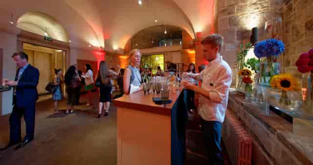 Networking event in Wren Suite, St. Paul's Cathedral with elegant decor and warm lighting.
