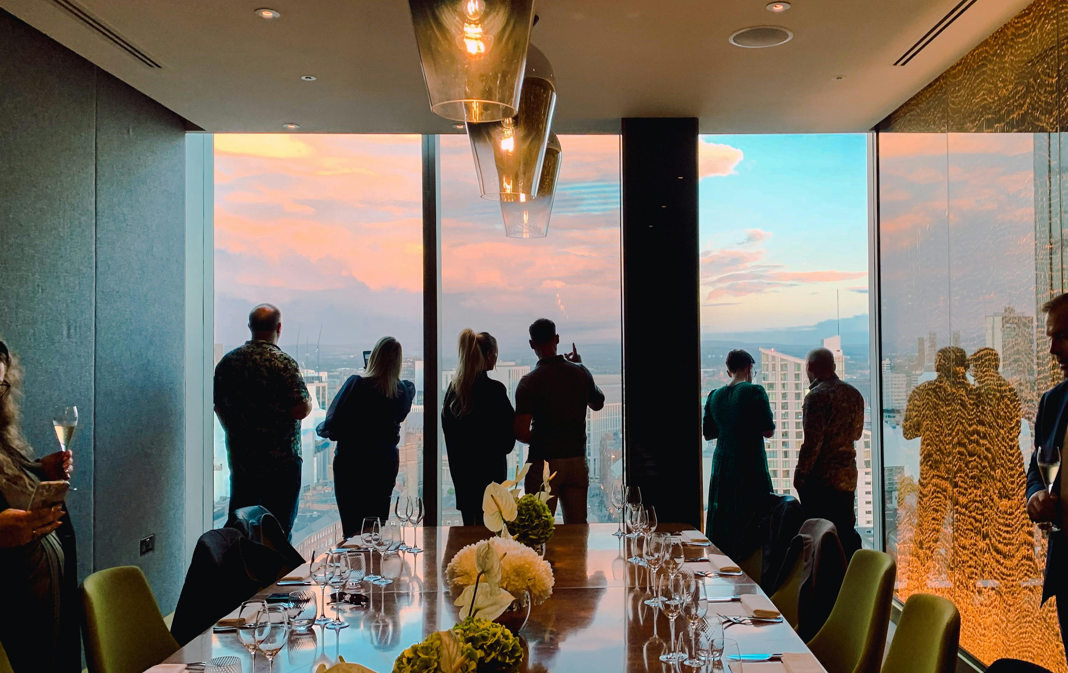 Private dining room at 20 Stories Restaurant with skyline view for upscale events.