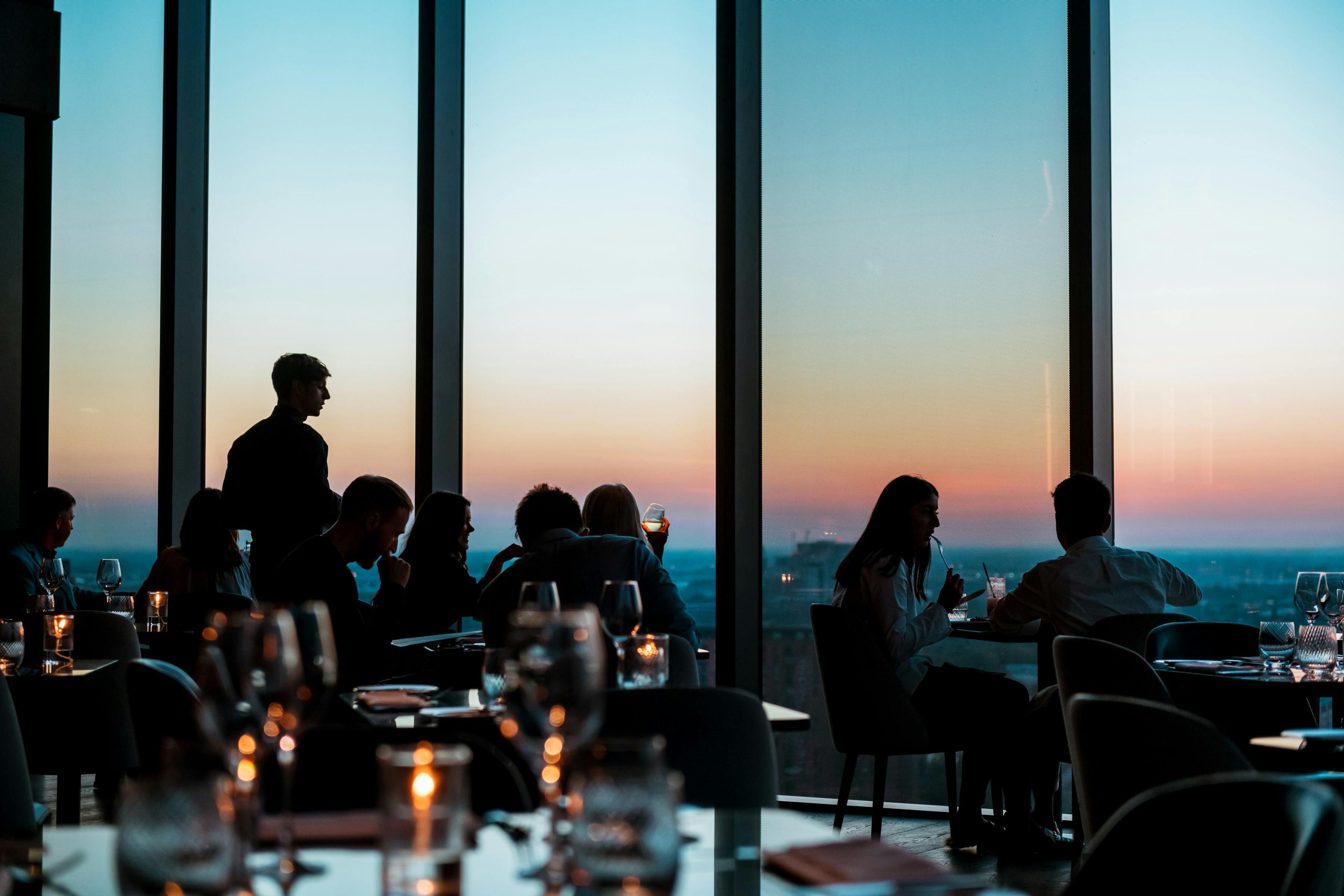 Upscale dining venue with sunset view, perfect for events and celebrations.