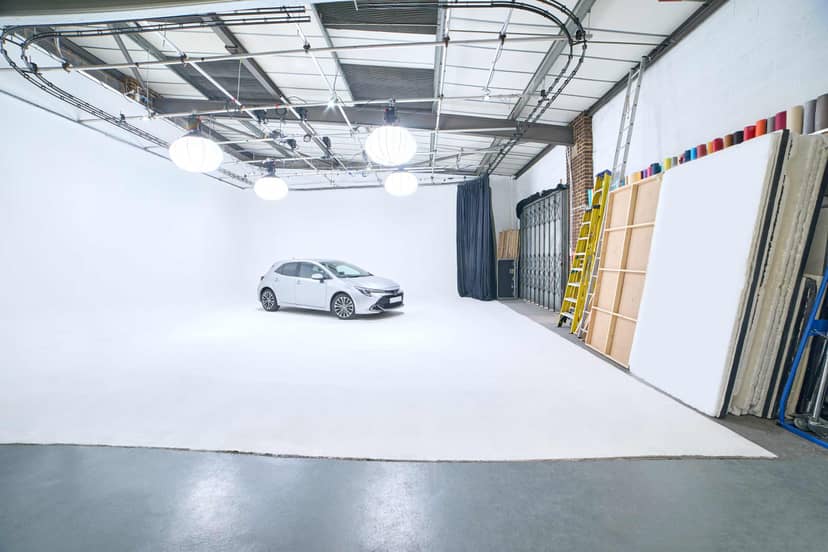 Versatile event space with white backdrop at Cineview Studios, ideal for product launches.