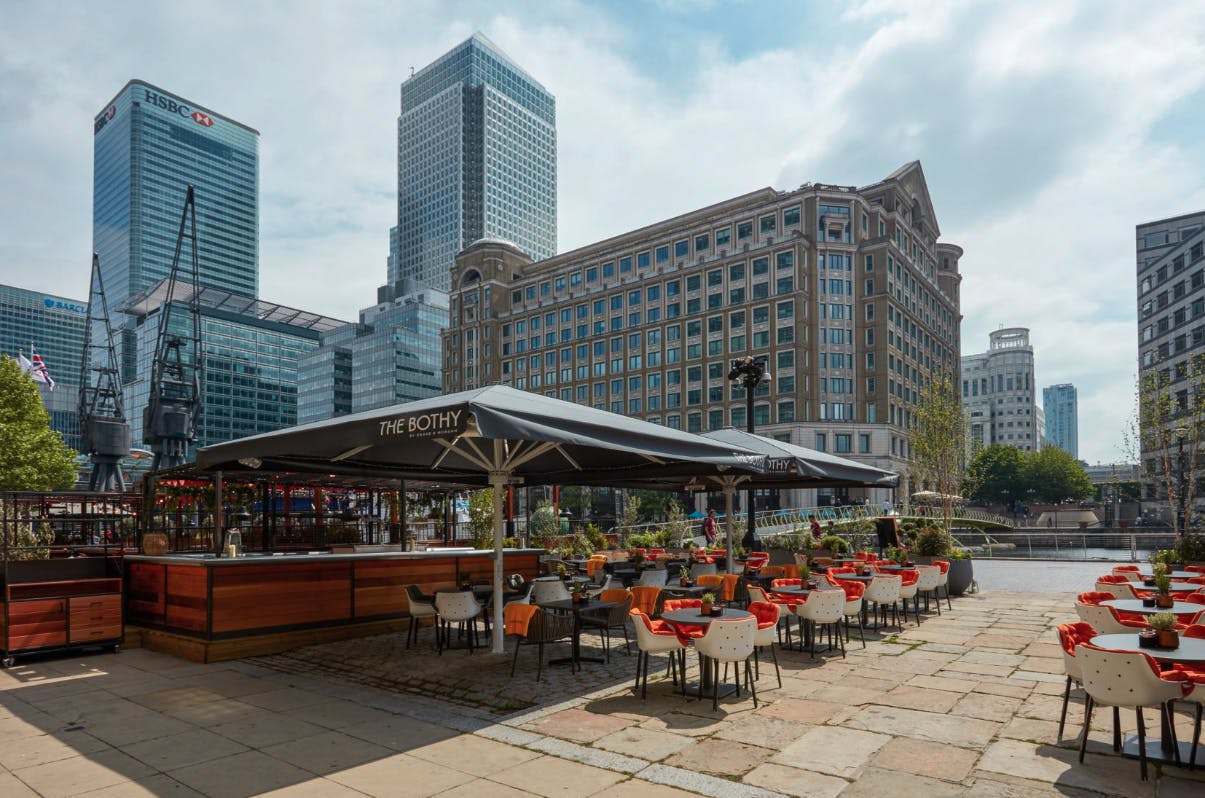 Vibrant outdoor venue at The Sipping Room for corporate events with stylish seating.