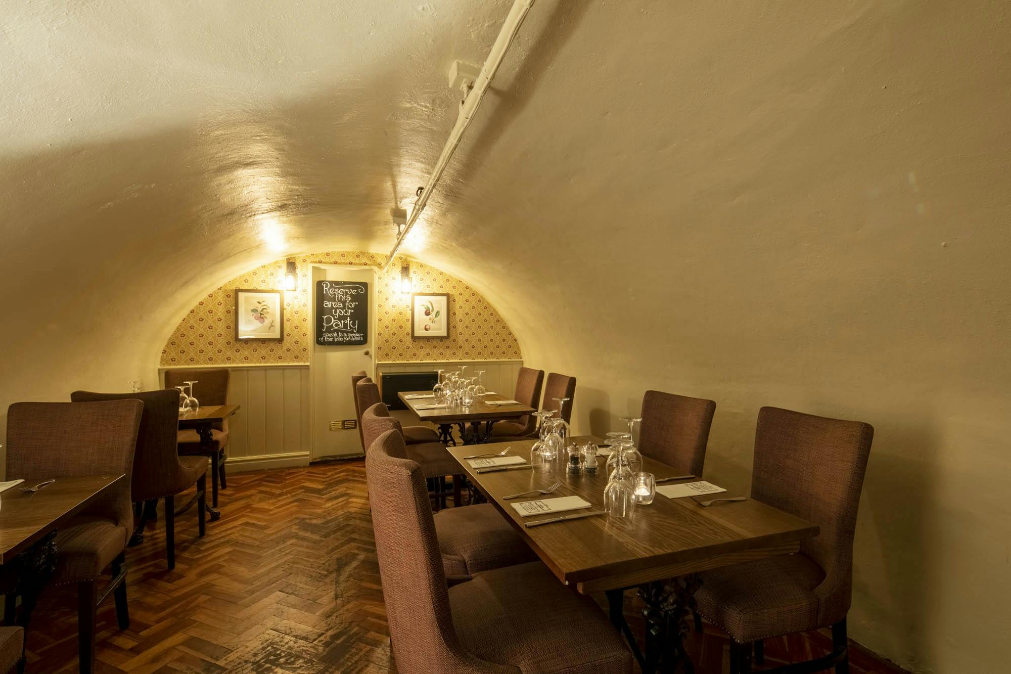 Cozy dining space at Apple Vault, Covent Garden for private events and meetings.