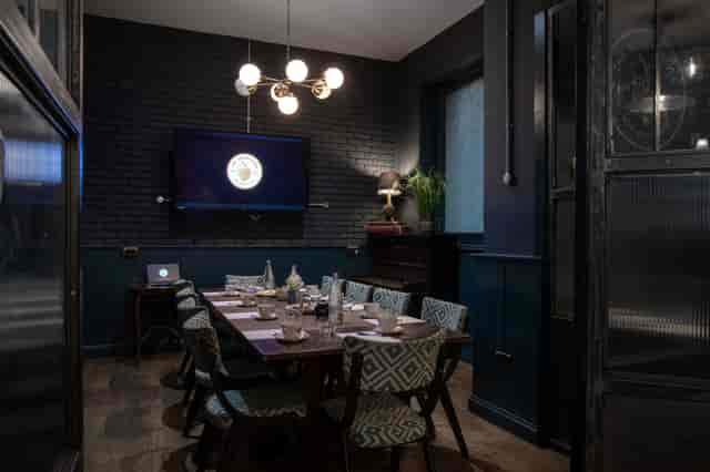 Stylish meeting room at The Tokenhouse with modern lighting for conferences and gatherings.