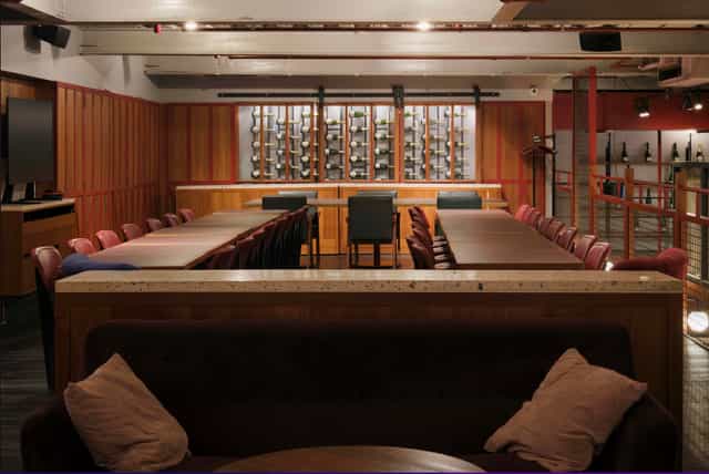 Mezzanine Temper City private dining room, wine display