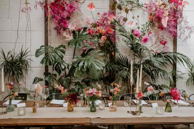 Elegant event space with floral backdrop for intimate gatherings and celebrations.