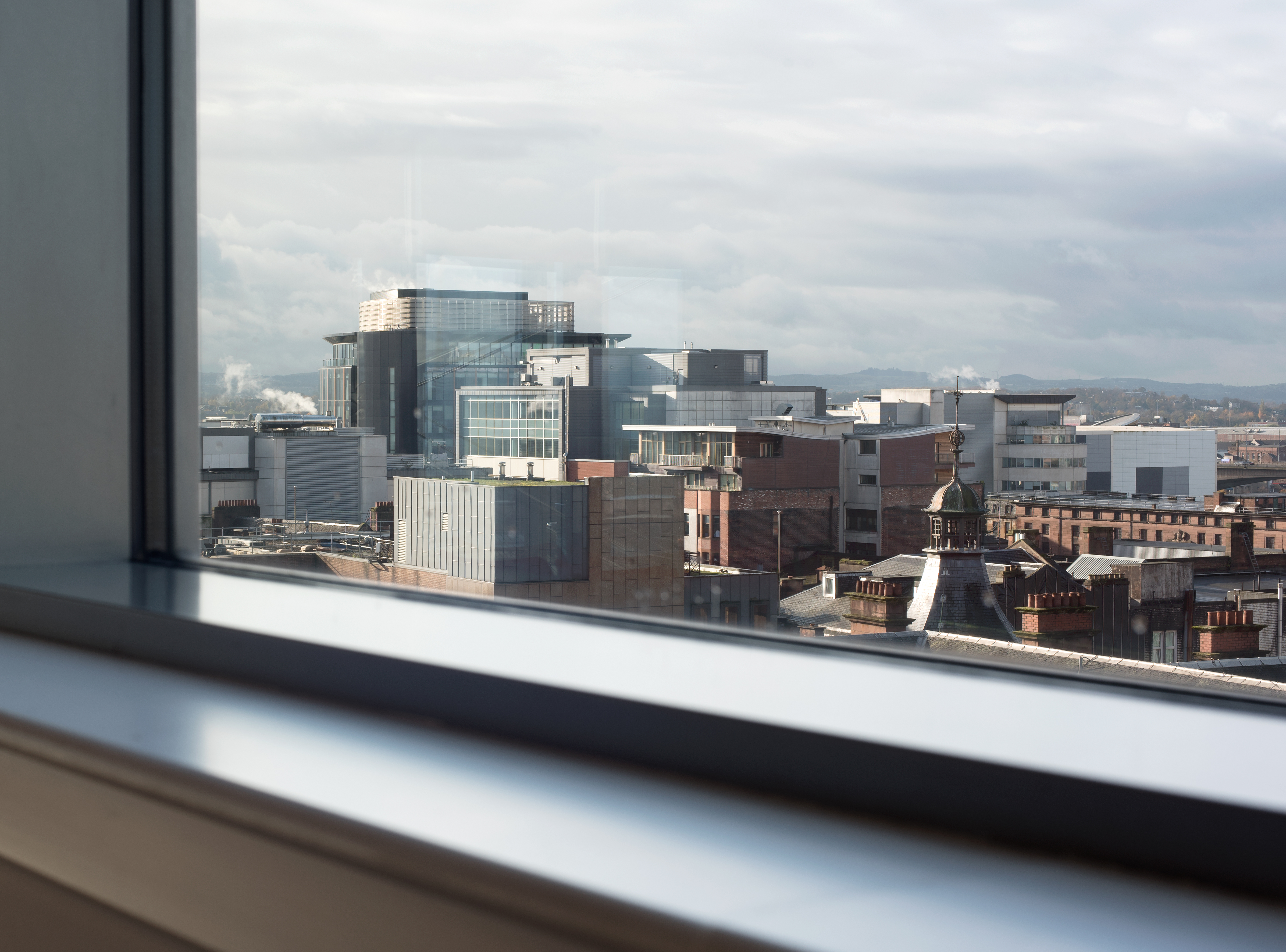 Modern urban skyline view from Climb in thestudio Glasgow, ideal for corporate events. - Banner