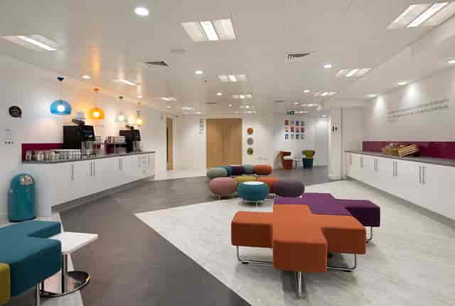 Modern break area in Proclaim Glasgow with colorful seating for events and meetings.